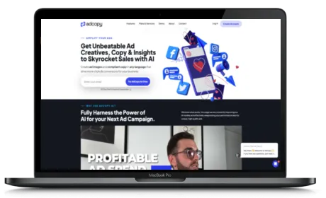 AdCopy.ai website displayed on a Macbook