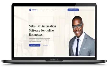 AtomicTax website displayed on a Macbook