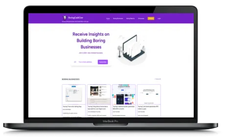 BoringCashCow website displayed on a Macbook