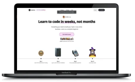 CodeFast website displayed on a Macbook