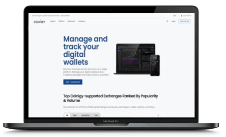 Coinigy website displayed on a Macbook