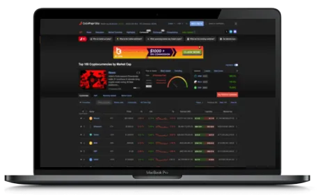Coinpaprika website displayed on a Macbook