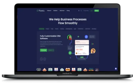 Flowlu website displayed on a Macbook
