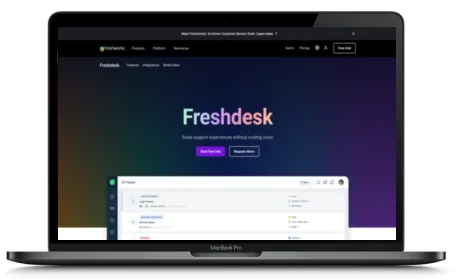 Freshdesk website displayed on a Macbook
