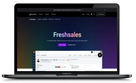 Freshsales website displayed on a Macbook