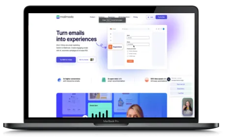 Mailmodo website displayed on a Macbook