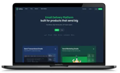 Mailtrap website displayed on a Macbook