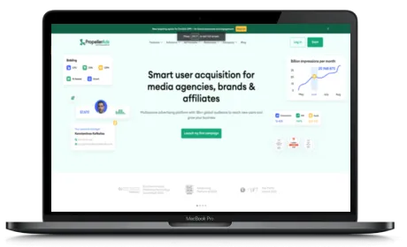 PropellerAds website displayed on a Macbook
