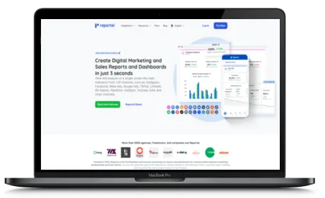 Reportei website displayed on a Macbook