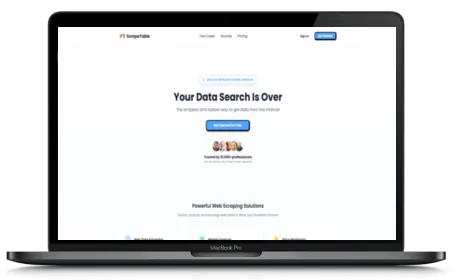 ScrapeTable website displayed on a Macbook