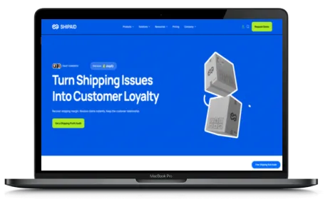 SHIPAID website displayed on a Macbook