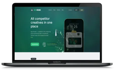 Spy.House website displayed on a Macbook