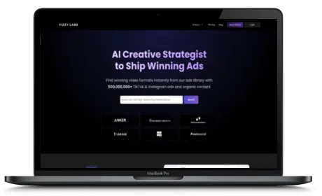 Vizzy Labs website displayed on a Macbook