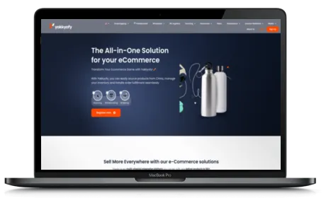 Yakkyofy website displayed on a Macbook